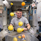NASA astronaut Kjell Lindgren struggling to contain fruit that arrived on the ISS on August 25, 2015. Lindgren was one of 10 astronauts included in a new study looking into the effects of long-duration missions.